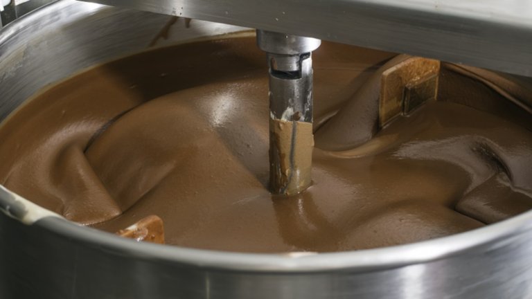 Machine for mixing chocolate. Close up