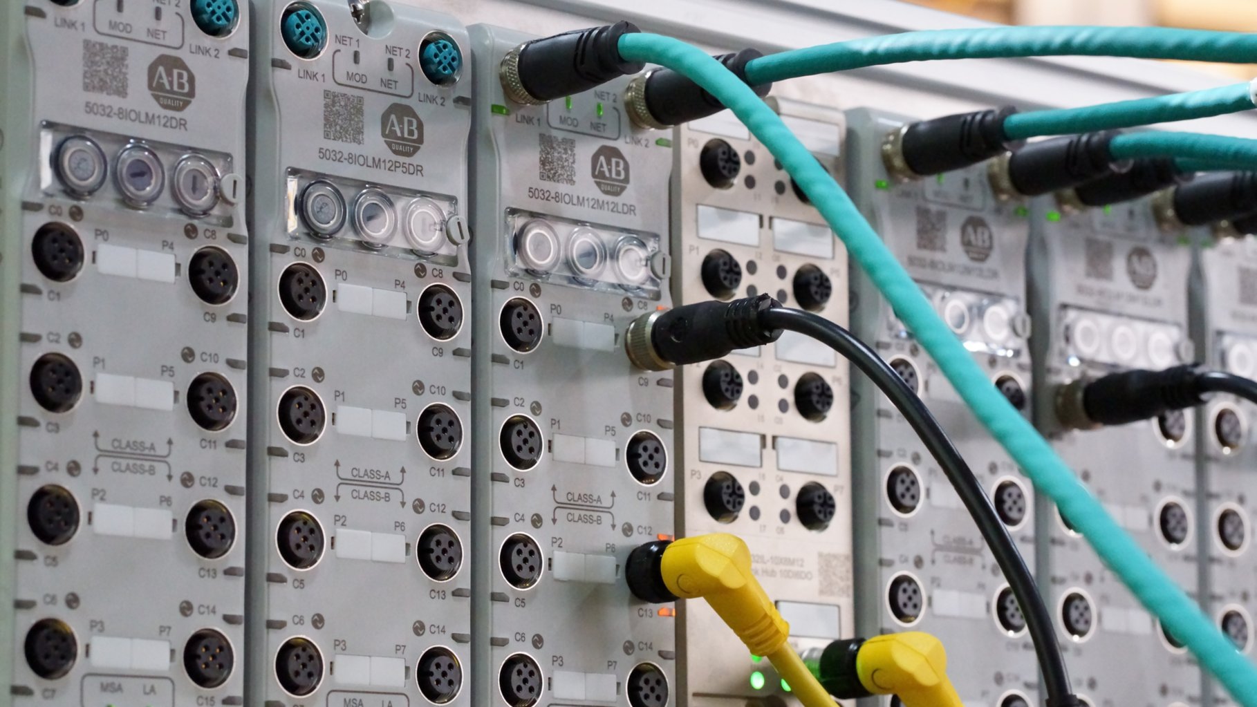 Close-up demonstration setup of ArmorBlock 5000 I/O IO-Link master blocks  with cables 