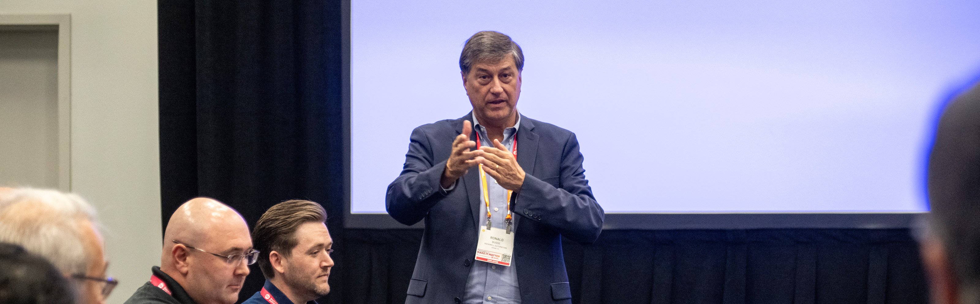 man speaking at AF session breakout