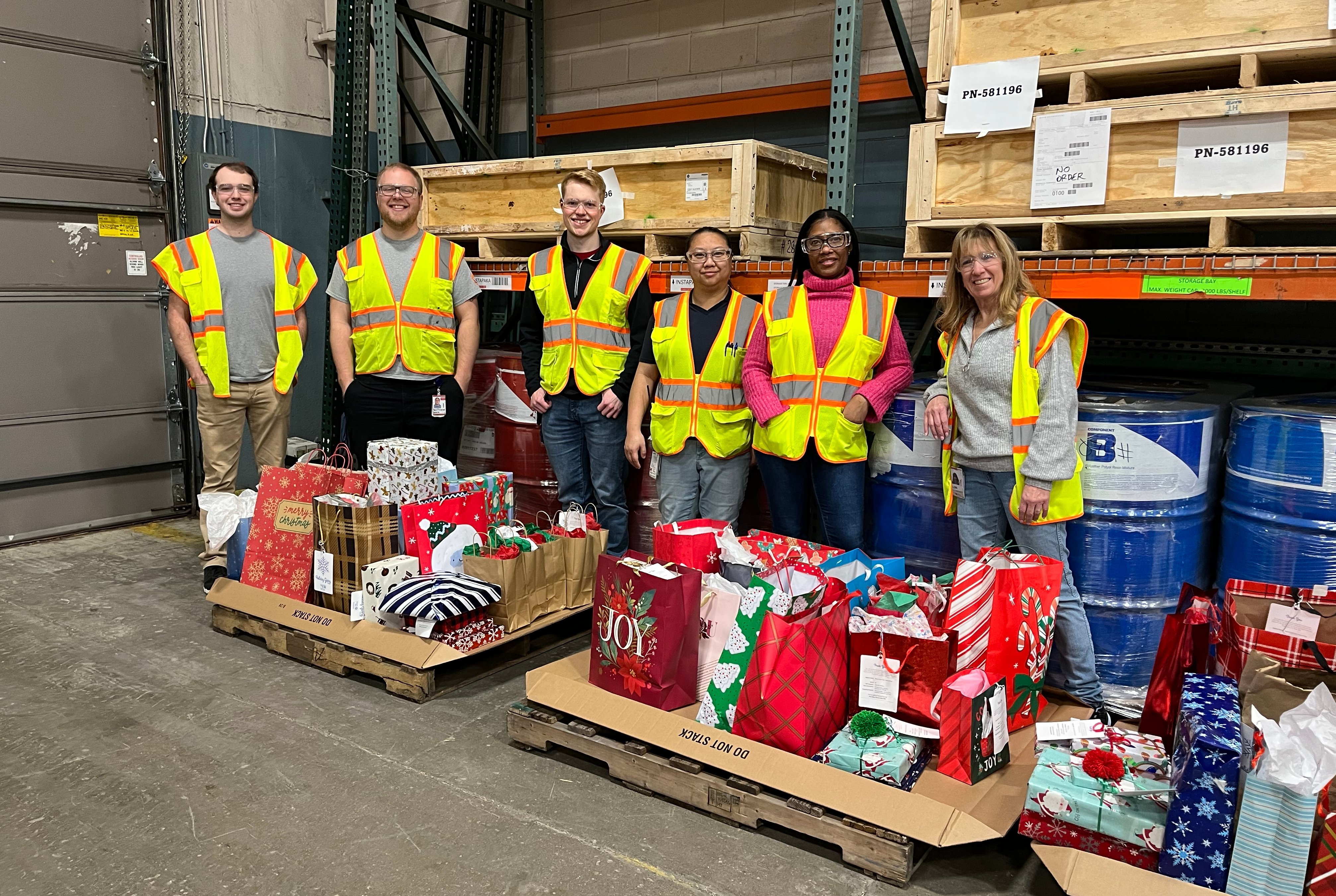 Employees working on Giving Tree for the holidays