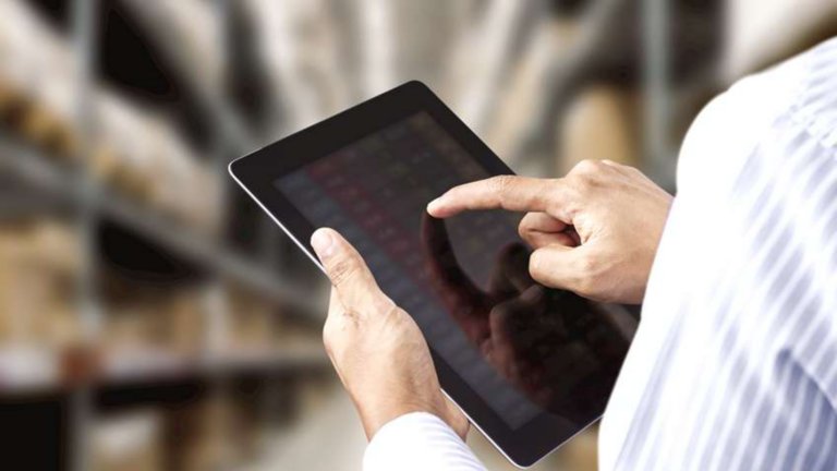 Person holding tablet