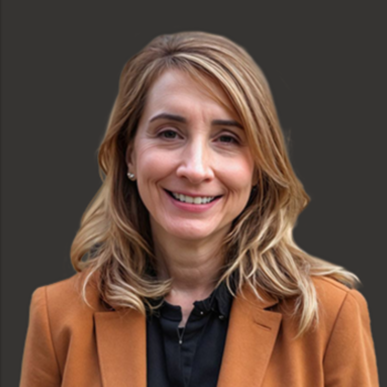 headshot of Sharon VanZeeland—Vice President of Strategy & Corporate Development, Rockwell Automation on grey background