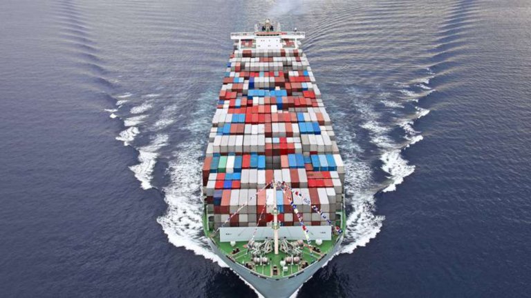 Aerial view of a ship full of shipping containers