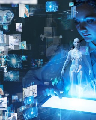 Doctor reviewing virtual skeleton
