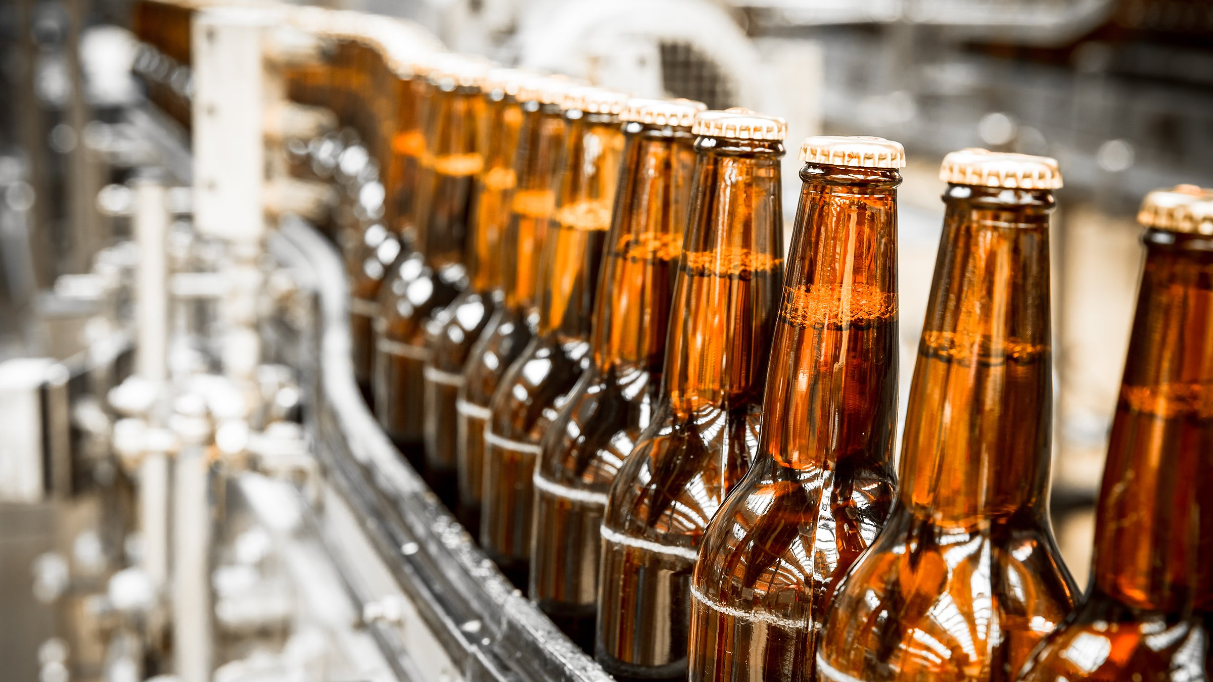 Bottles on conveyor without labels