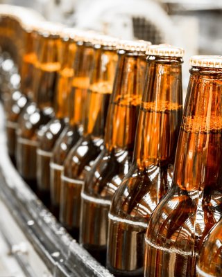Bottles on conveyor without labels