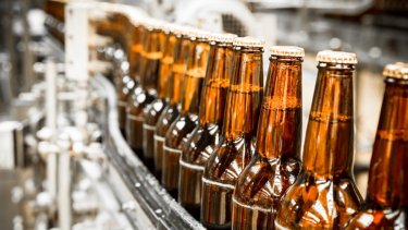 Bottles on conveyor without labels