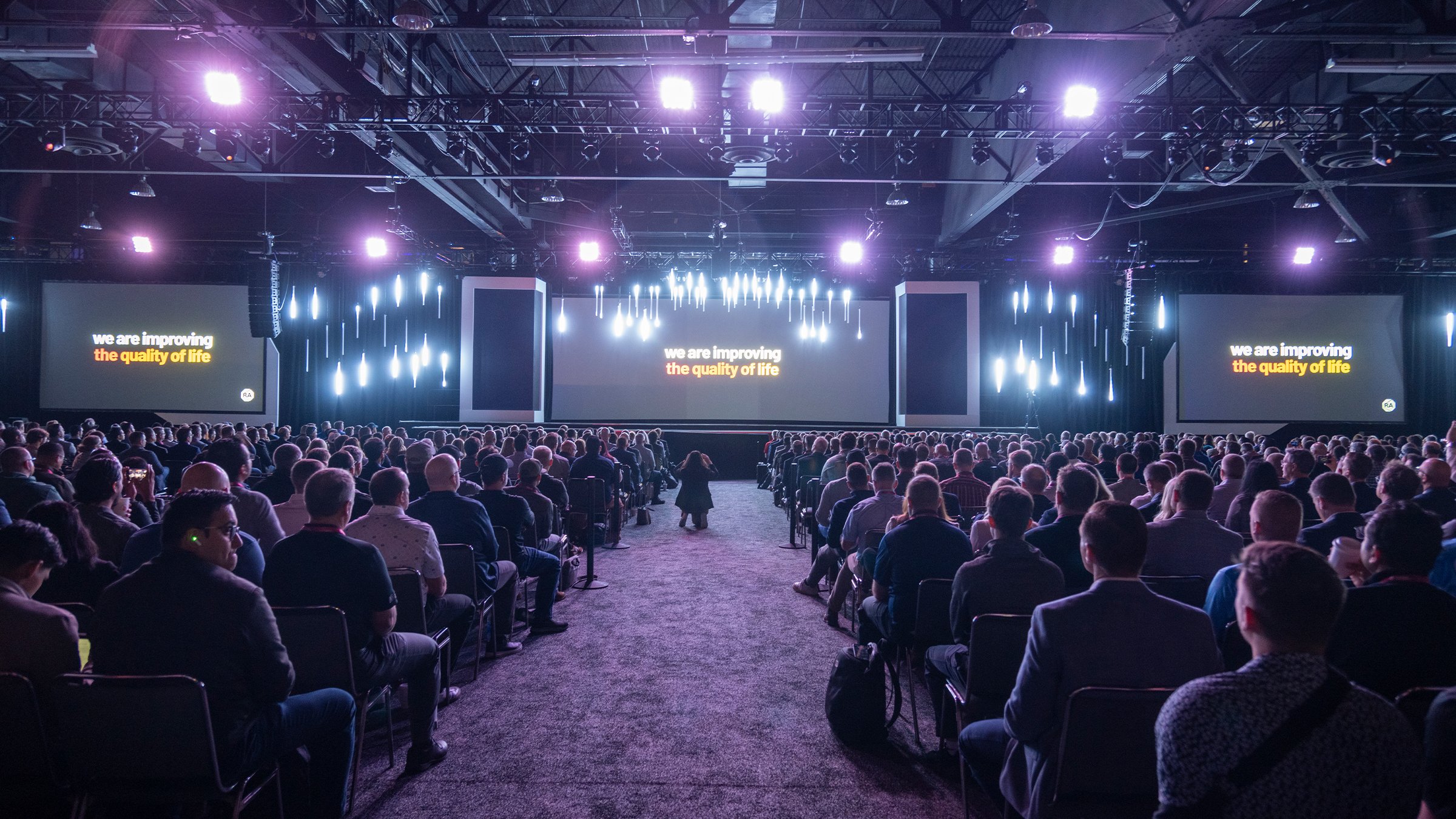 A large audience watching a presentation at Automation Fair