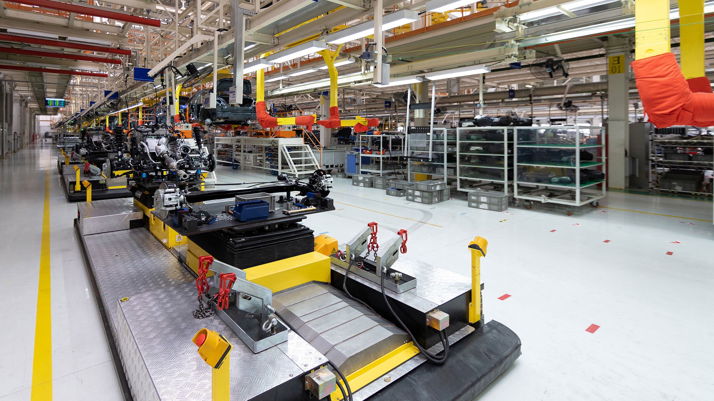  automated-car-assembly-line-plant-automotive-industry-shop-production-assembly-machines-new-car-warehouse
