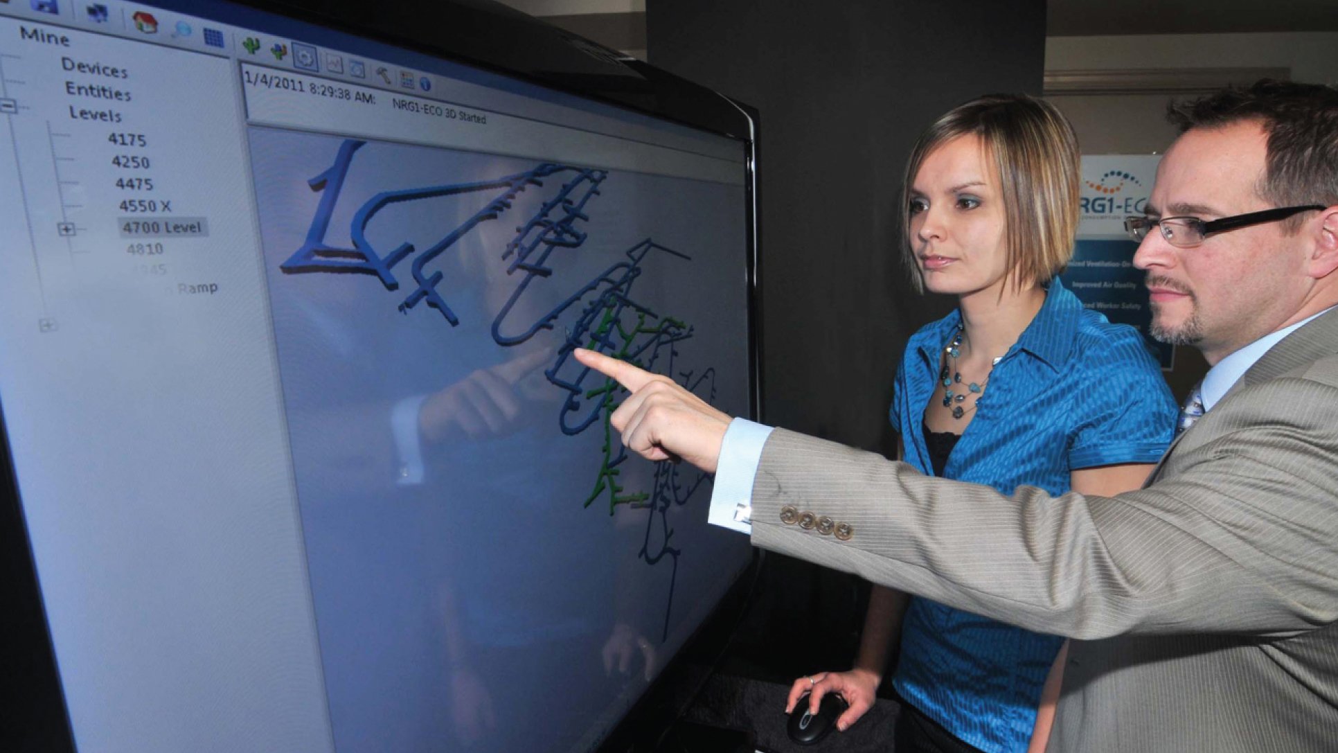 BESTECH representatives showing visualisation on the screen