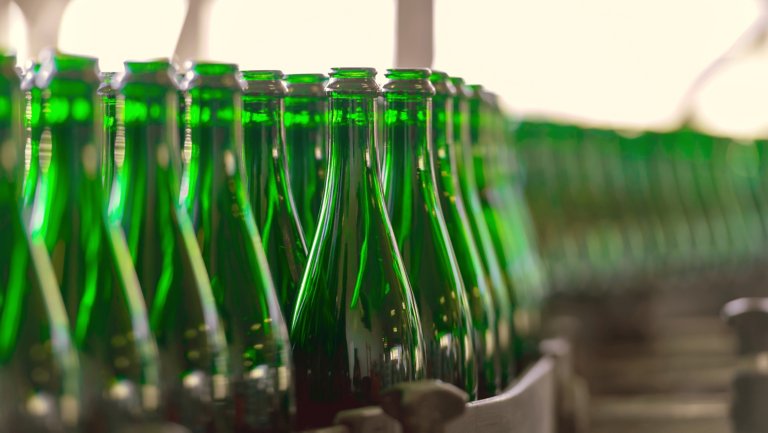 Bottling line of brand agnostic green glass bottles