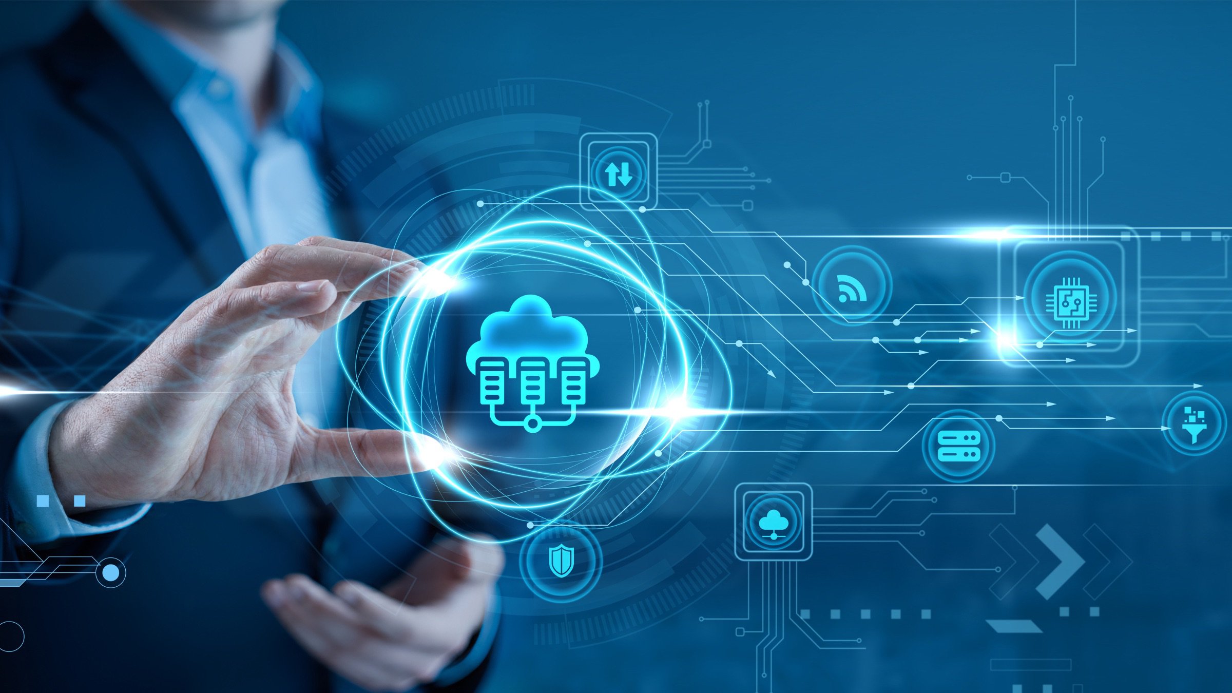 Businessman holding edge computing visualization in his hand, depicting data processing, network connectivity, computing, and smart technology infrastructure. 