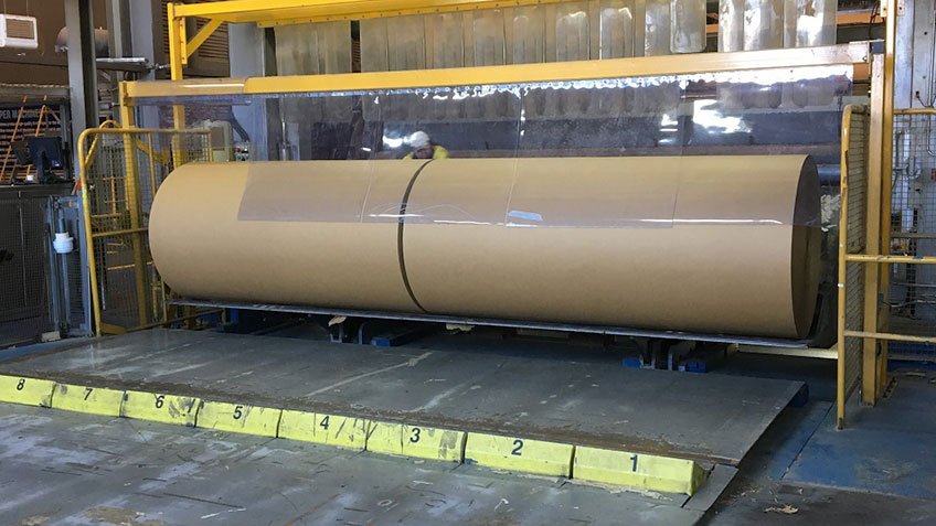 The jumbo roll then moves into the winder, which cuts the paper into smaller rolls.