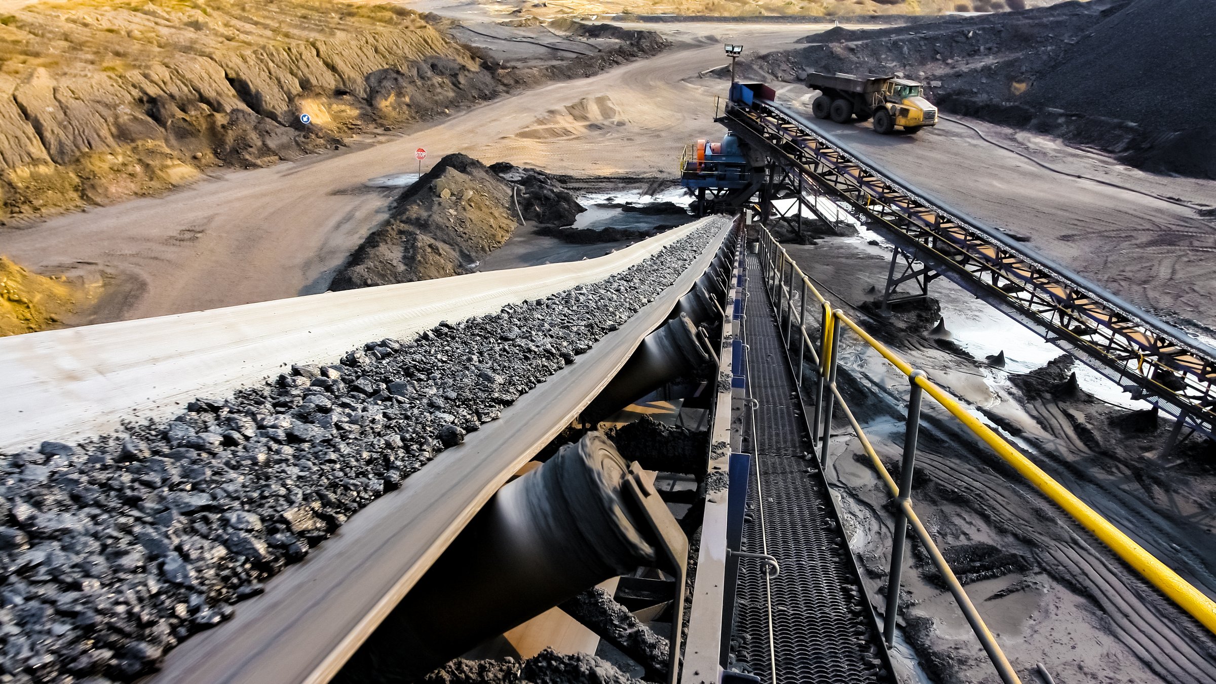 A conveyor belt for processing coal ore.