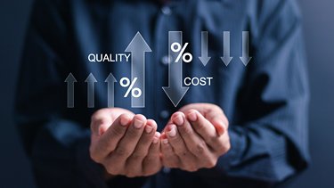 Cost and quality control concept. Person hold virtual cost and quality icons to Improve work efficiency for quality control and company cost reduction. Successful organization strategy and management
