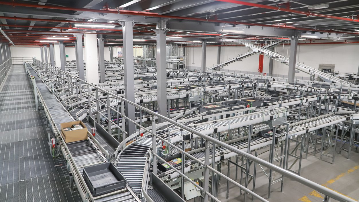 conveyor belt in a modern logistic warehouse