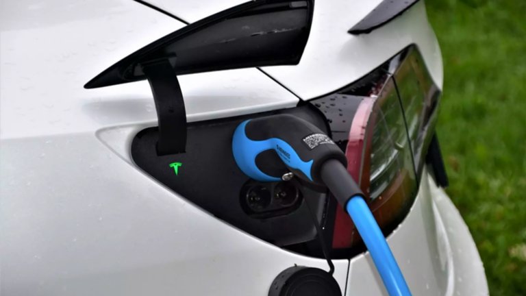 charger plugged into electric vehicle