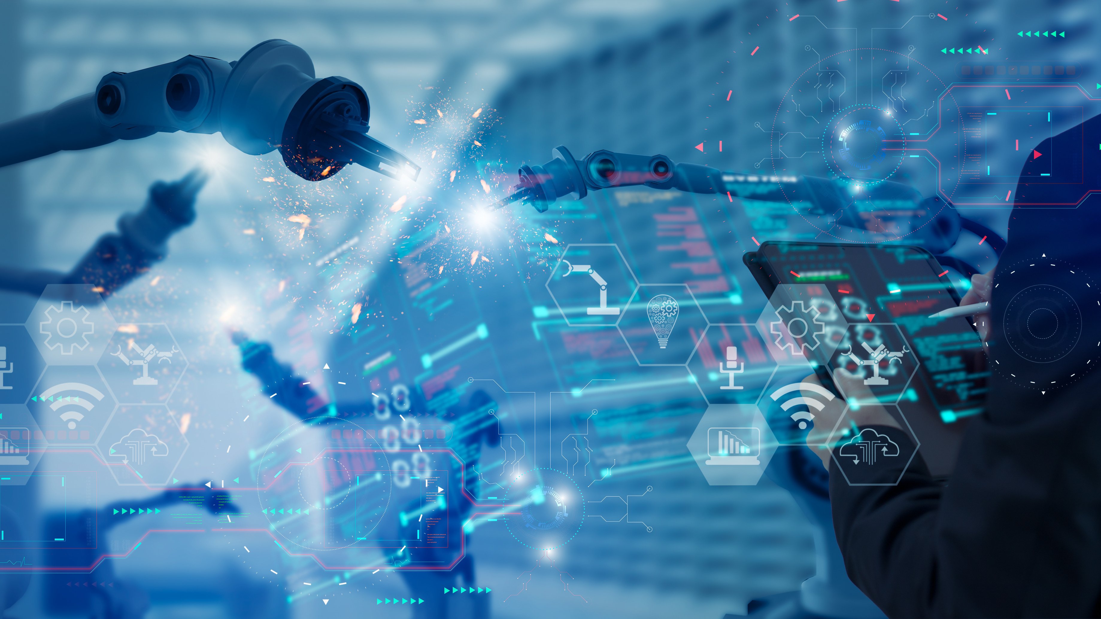 Industry engineer in factory,using visual smart tablet device,control automated robot arm machine learning operation,concept business and industry 4.0,Artificial intelligence or AI,with 5G network