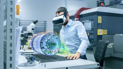 Engineer Wearing VR Headset Designs Engine Turbine on the Holographic Projection Table