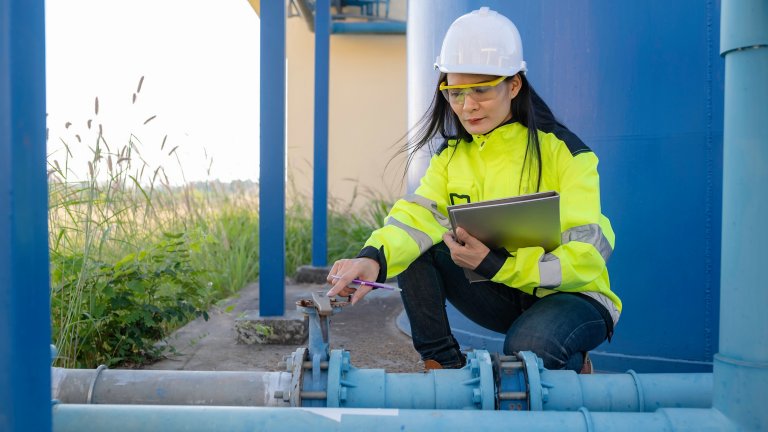 Environmental engineers work at wastewater treatment plants, plumber technician working at water supply