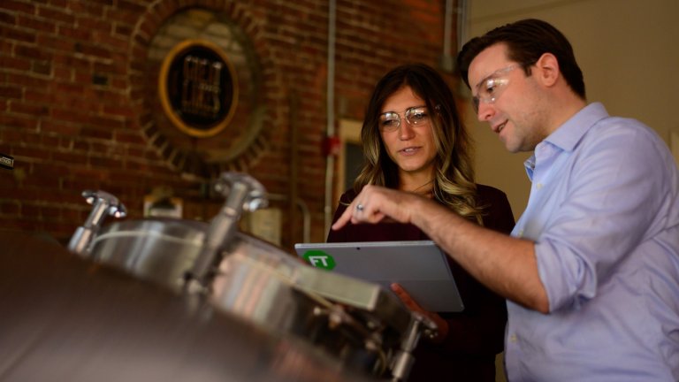 FactoryTalk Batch engineers discussing project