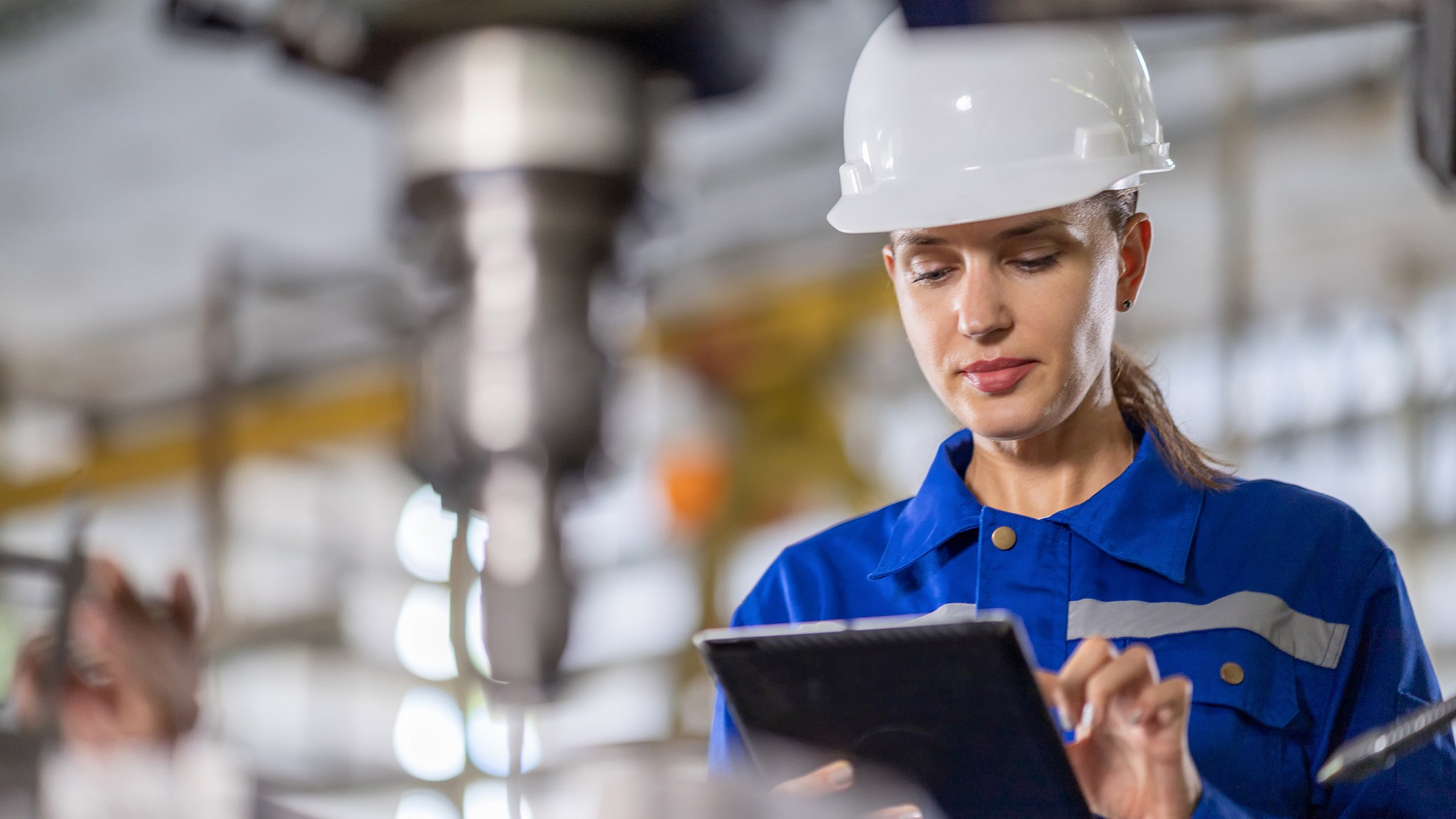 Female engineer holding tablet