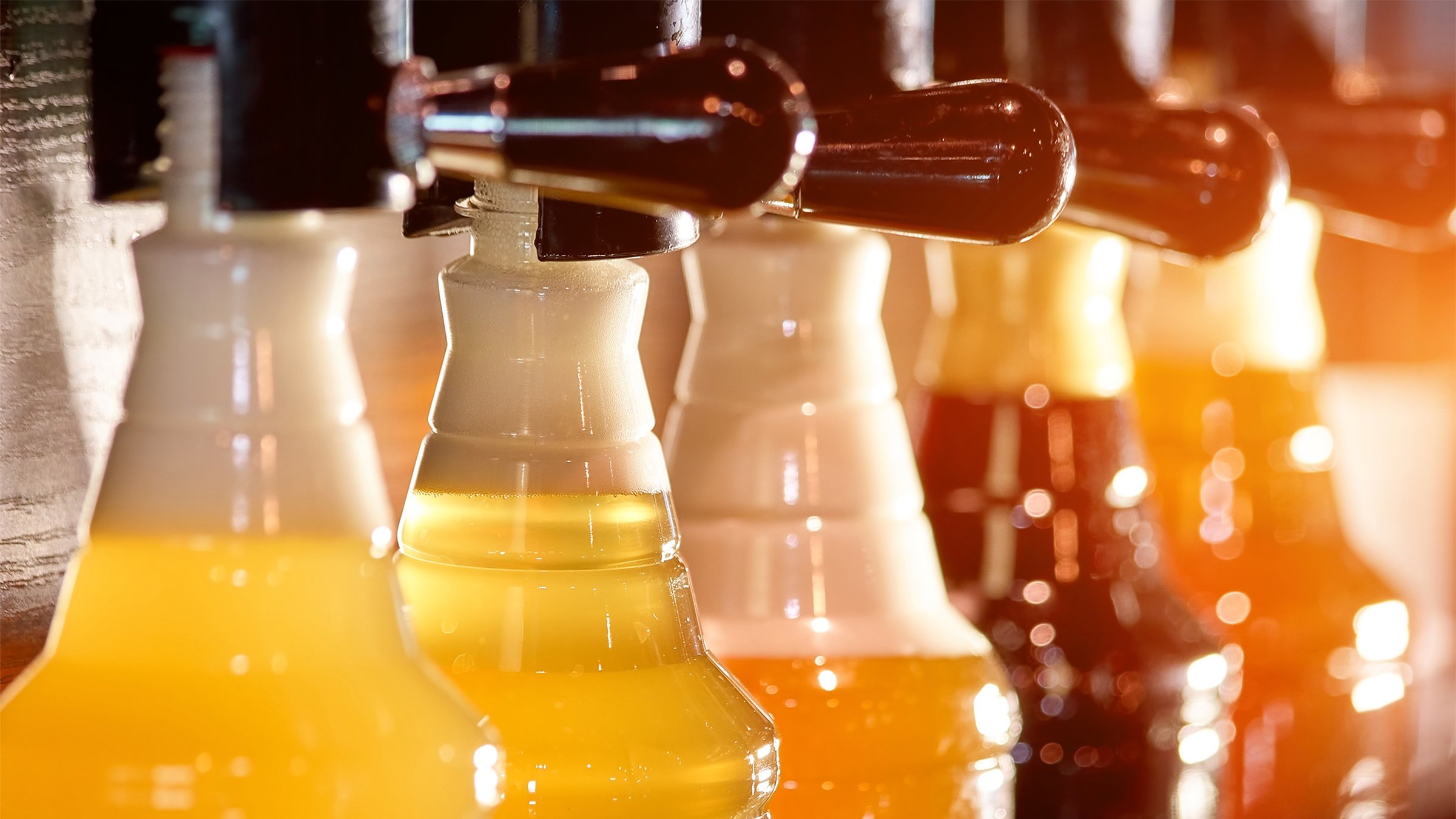 Filling of different kinds of bear bottles