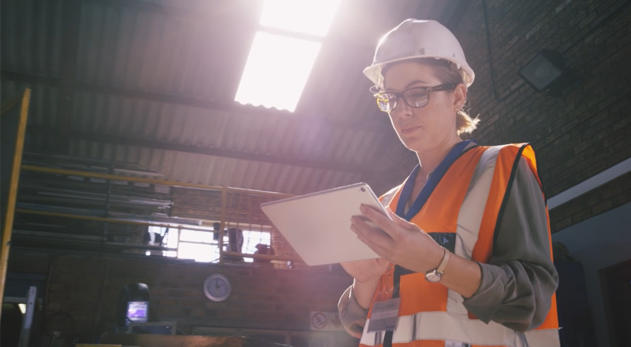 Female worker looking at ipad