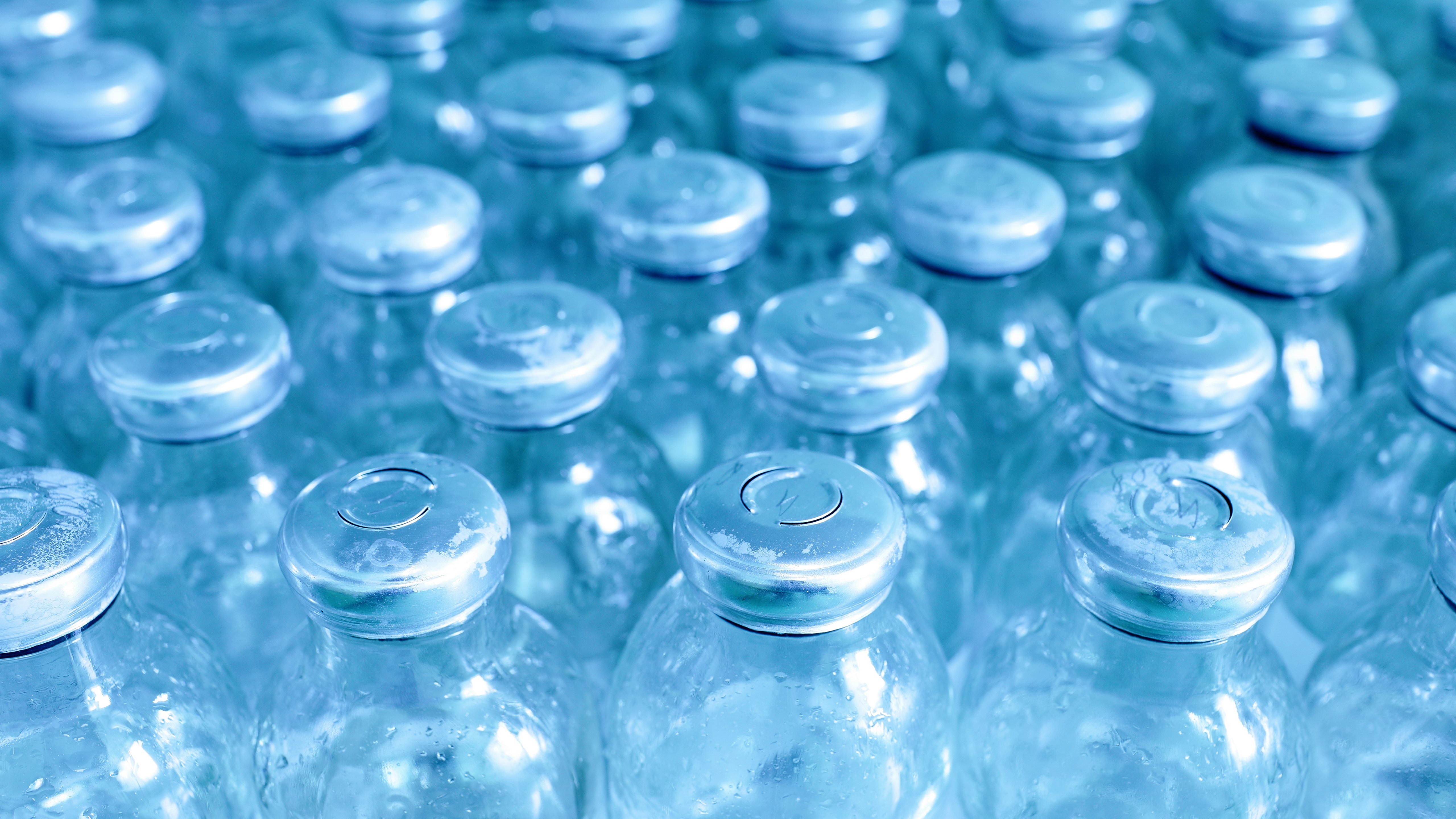 Glass bottles of medicine in a row