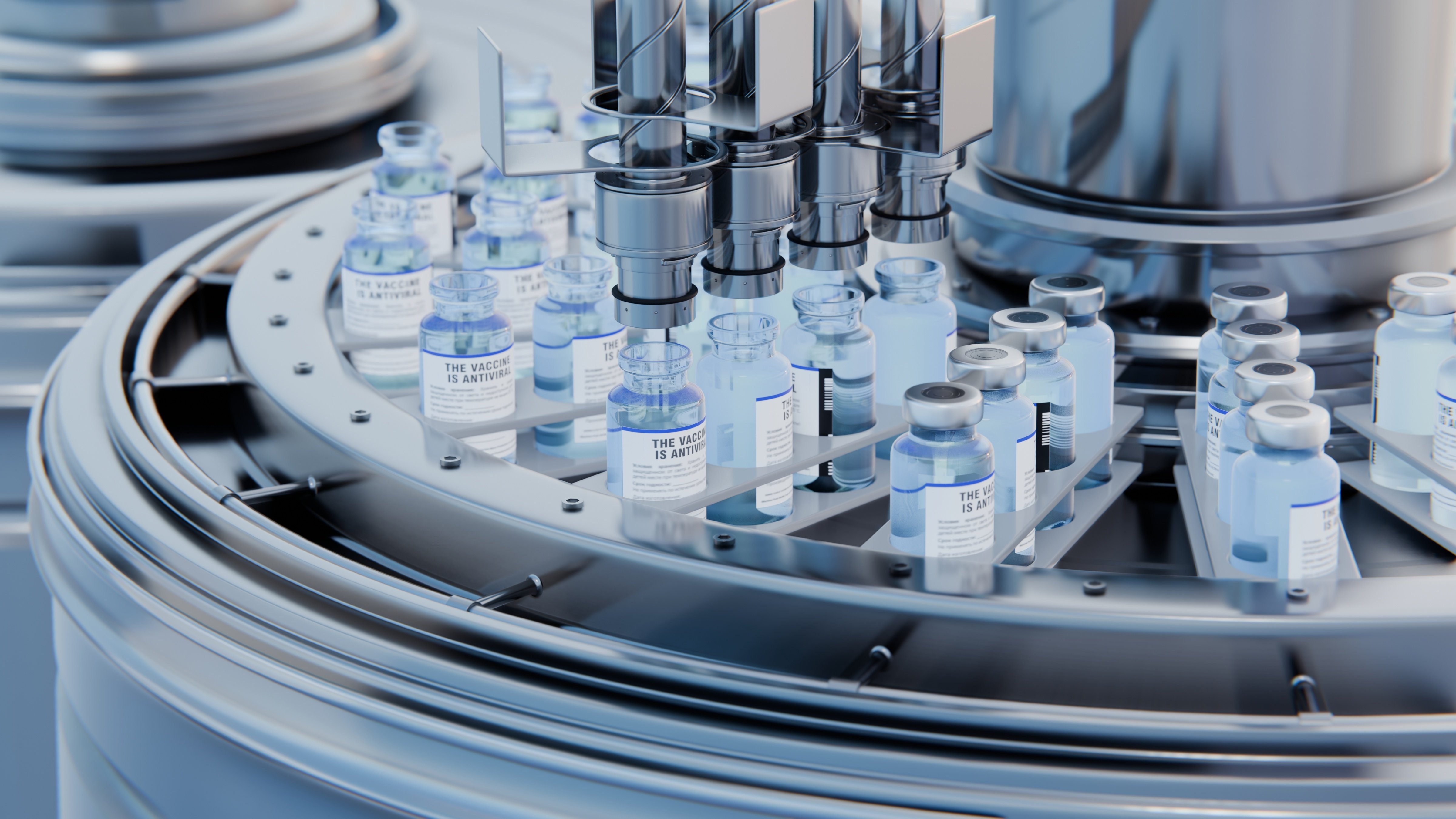 glass-medicine-vials-sitting-on-manufacturing-equipment