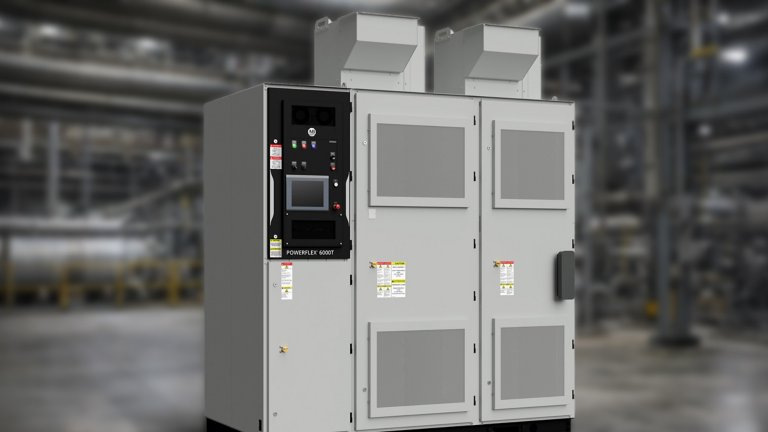 Tall grey three-section industrial cabinet houses medium voltage variable frequency drive motor control electronics
