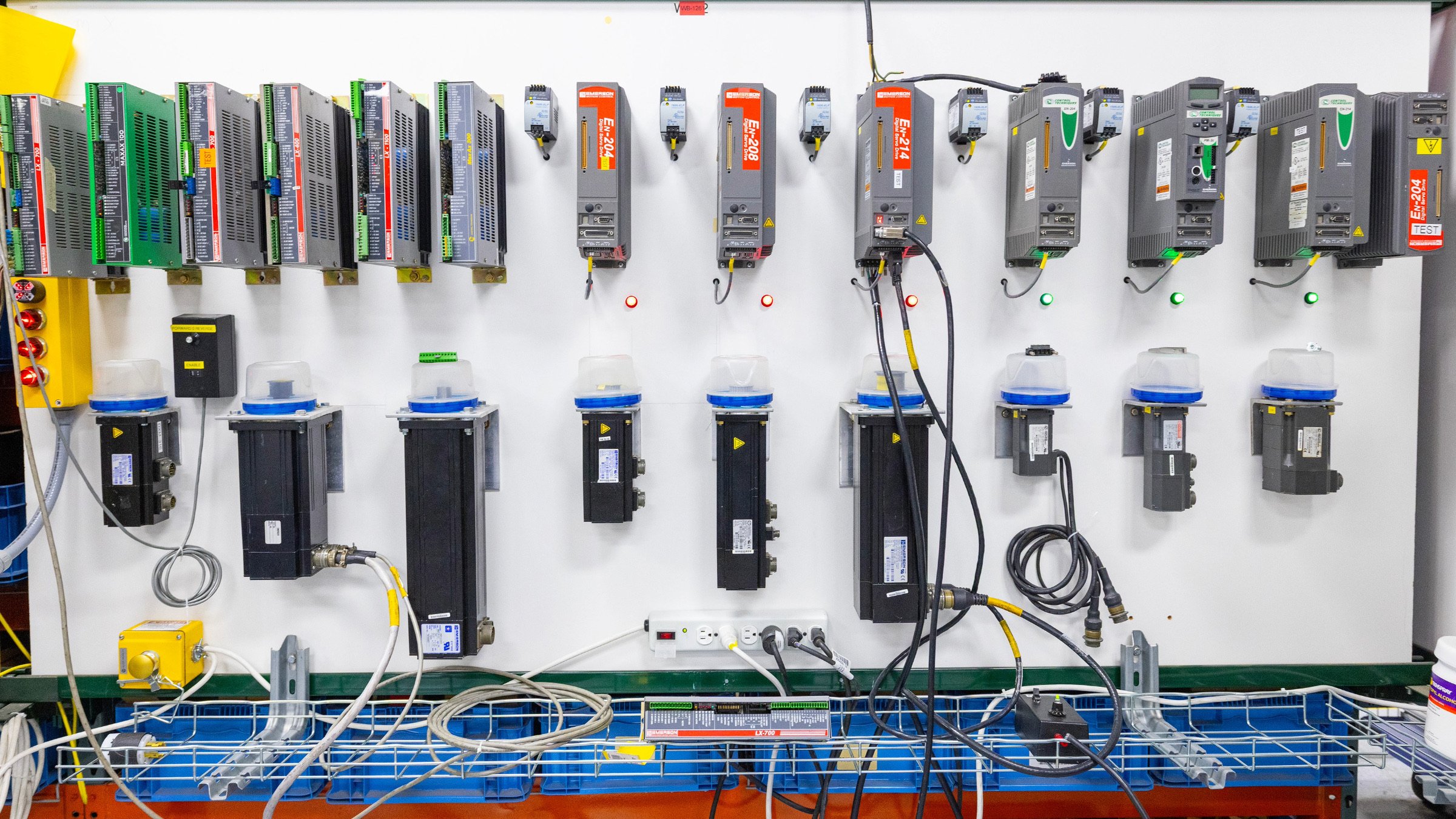Rockwell Automation provides quality repairs for drives, motors, controllers and electronics from over 7,000 manufacturers, including these Emerson and Control Techniques test stations for motors and drives.