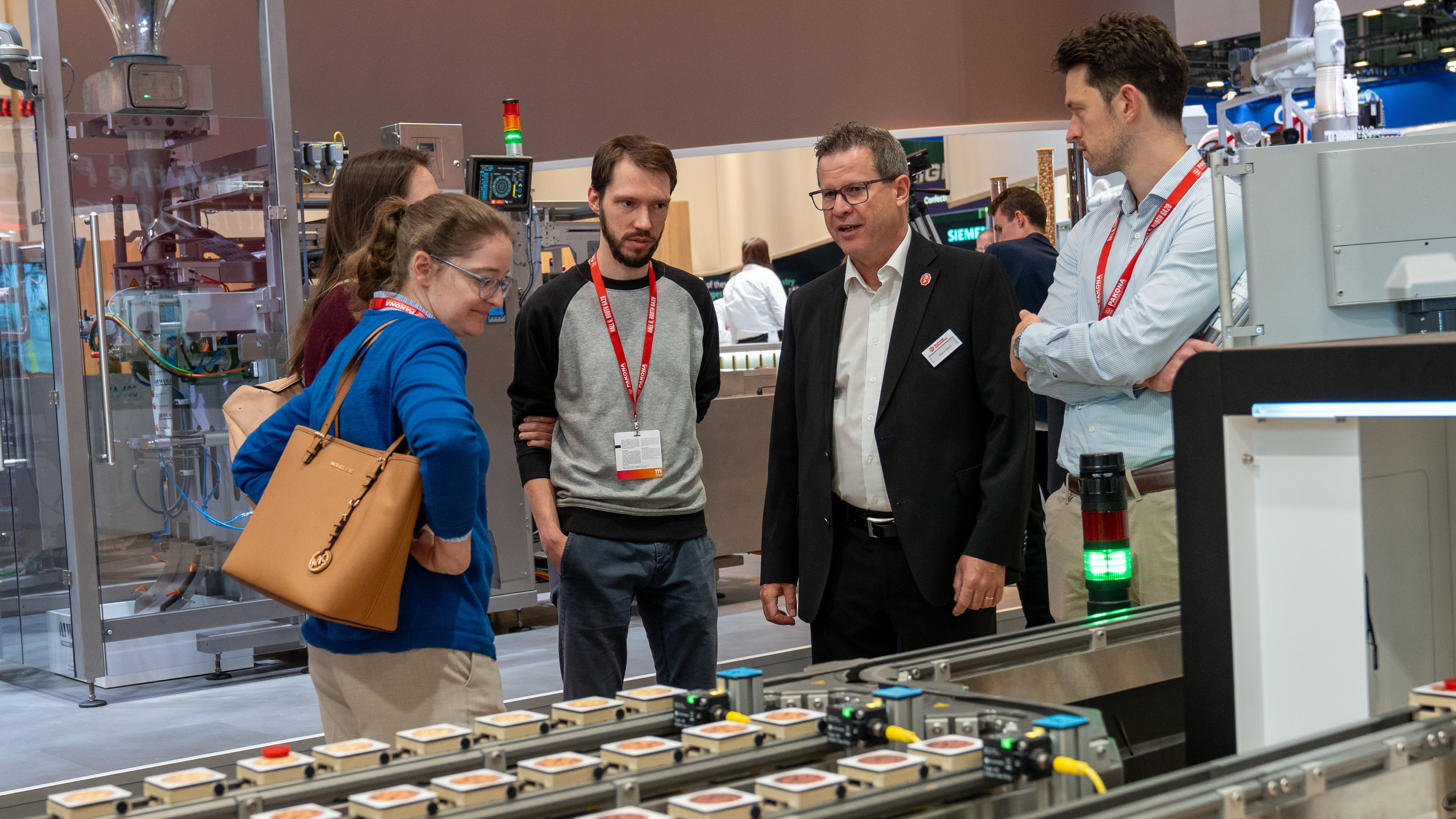 Staff at booth of Interpack 2026