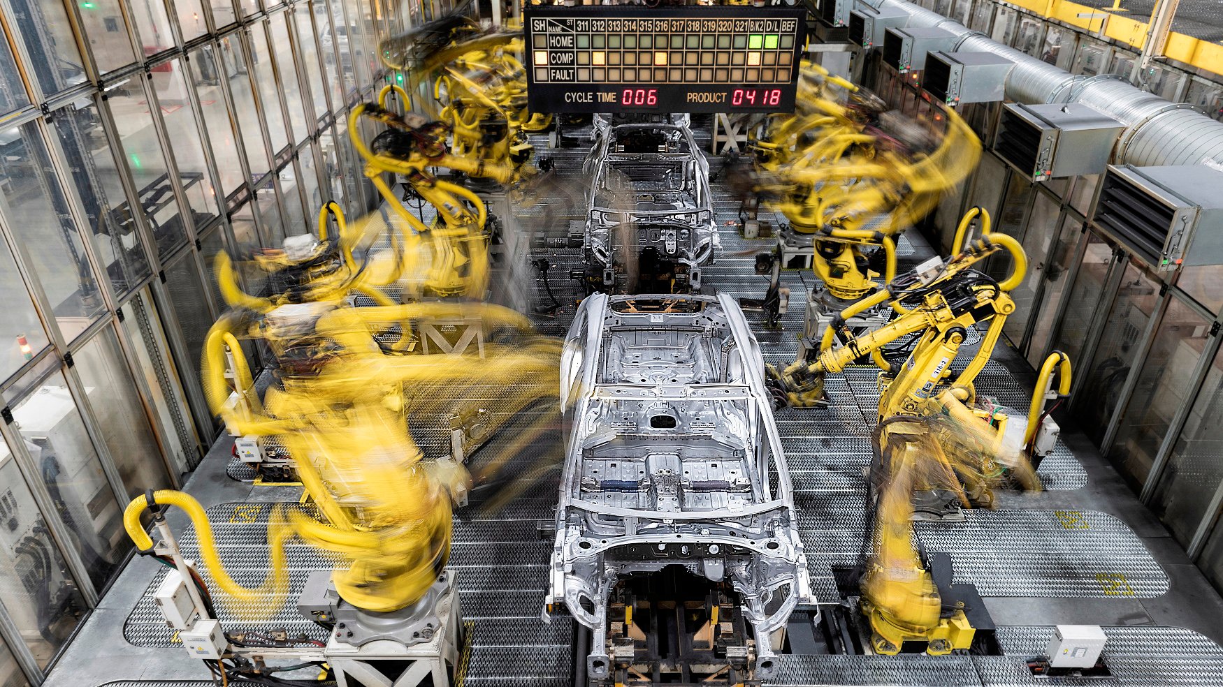 Machine creating a car.