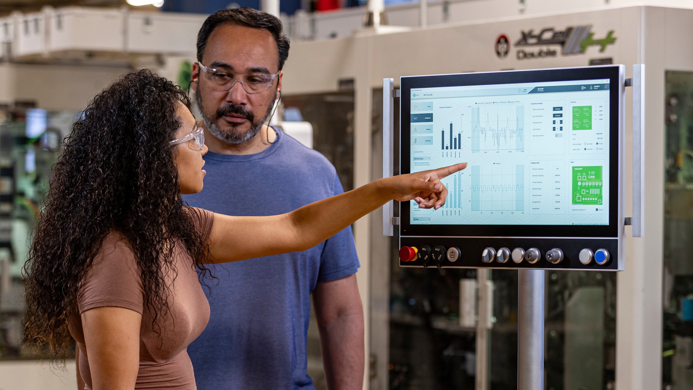 Man and woman using FactoryTalk Optix as their HMI solution.