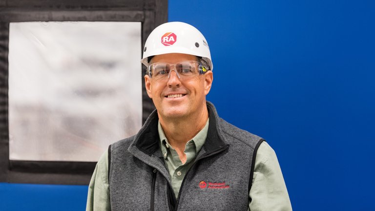 RA employee in white hardhat Great Lakes Cheese factory on Thursday, May 27, 2021 in Hiram, OH