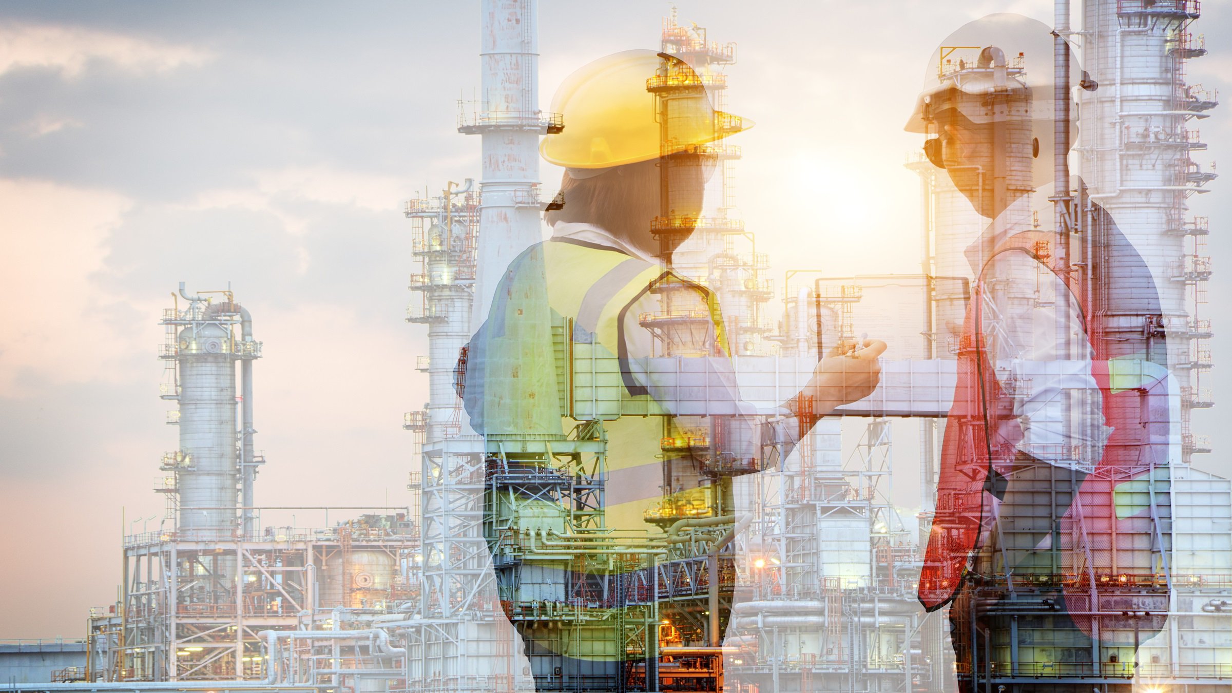 Double exposure of manager and engineer working with safety helmet with oil refinery industry plant background