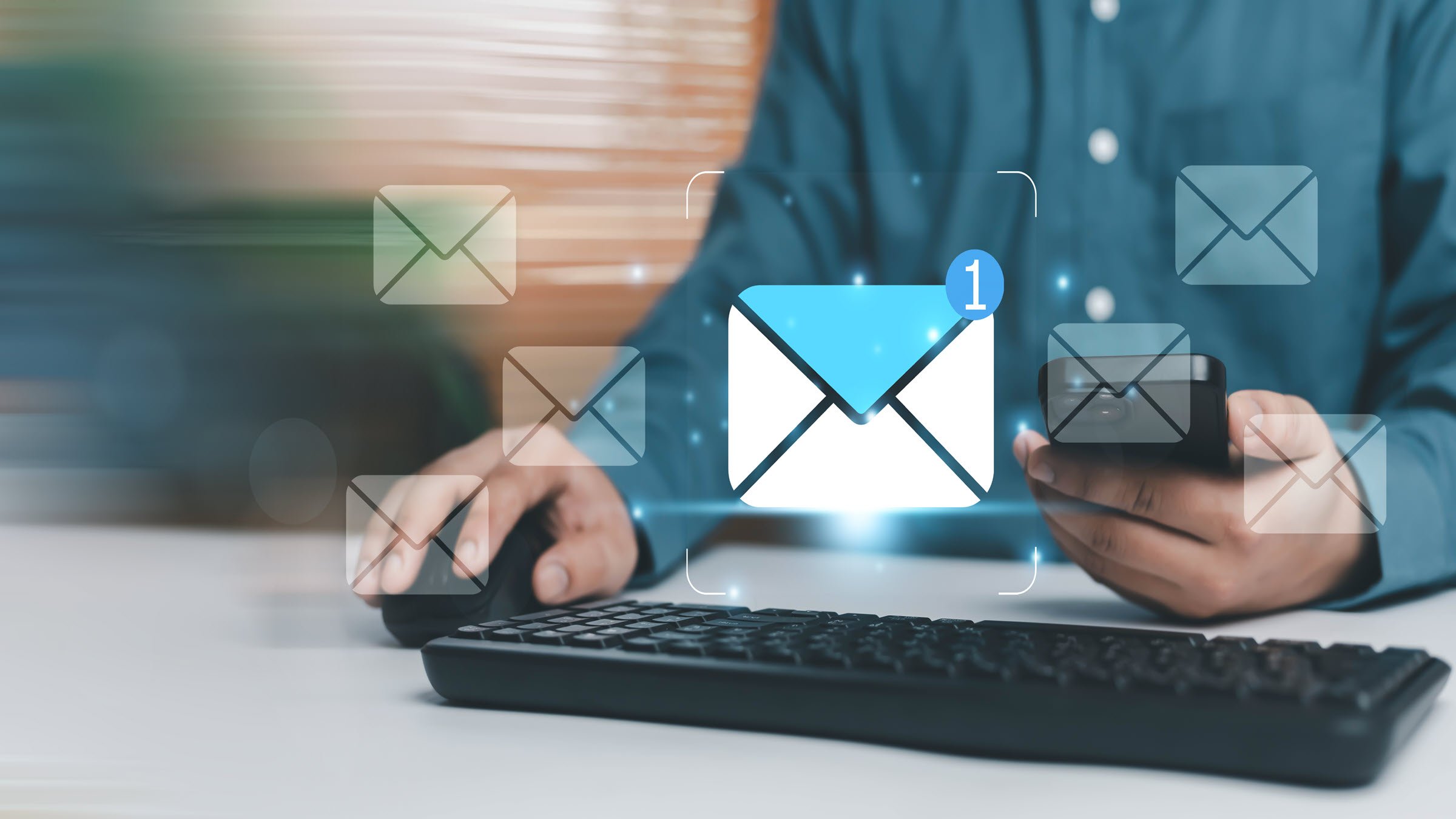 Business email notification concept with envelope icon over smartphone and computer keyboard. Digital communication, online messaging, inbox alert, marketing automation corporate technology network.