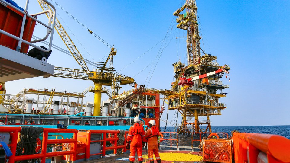 Offshore construction platform for production oil and gas. Oil and gas industry and hard work. Production platform and operation process by manual and auto function from control room