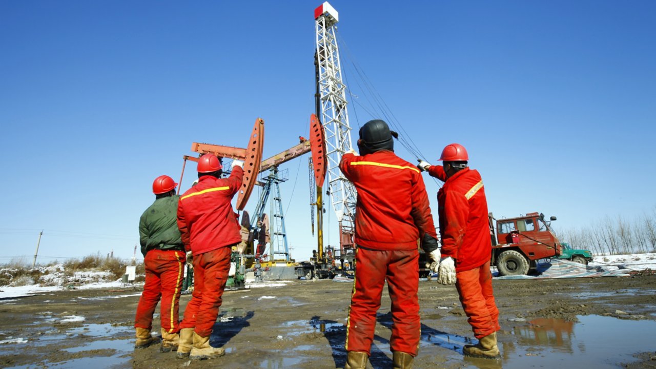 Oil workers working at oil drilling exploration