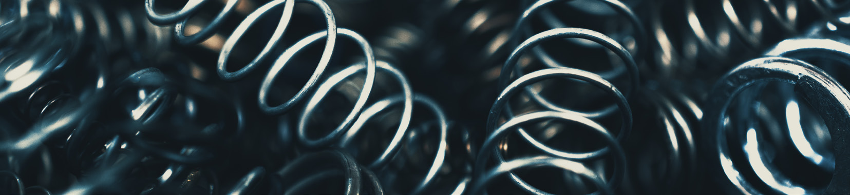 close-up photo of black metal springs