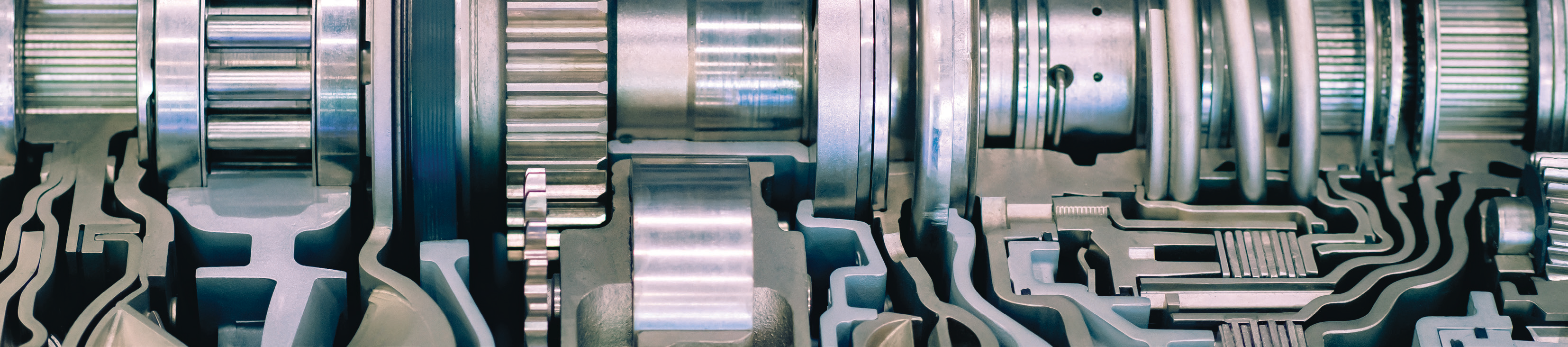close-up photo of metal components and machinery parts with industrial textures