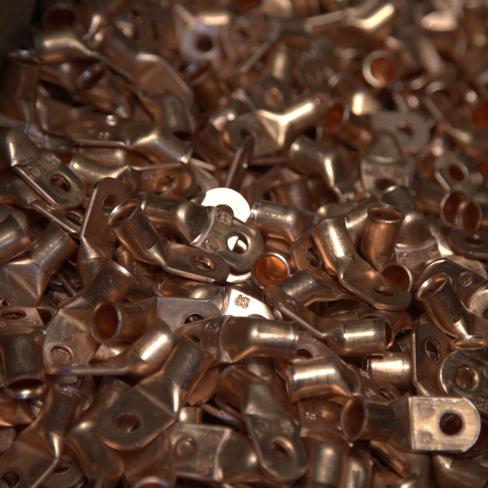 close-up photo of copper-colored metal parts