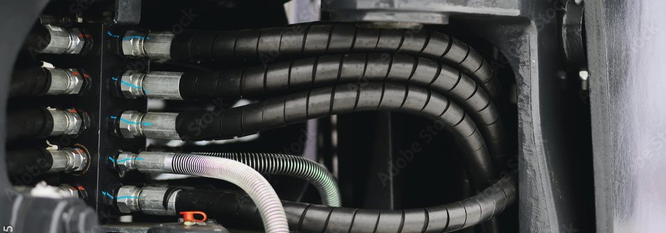 close-up photo of industrial electrical wiring and connectors in a control panel