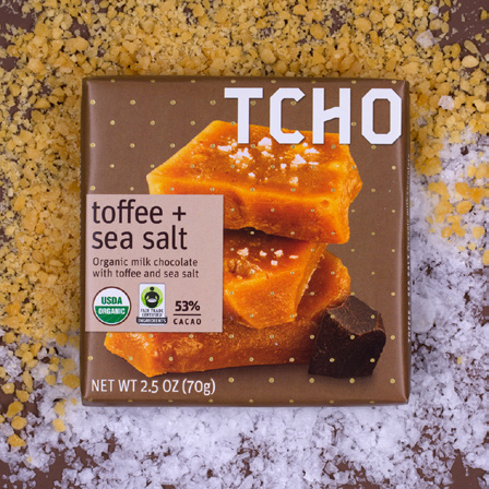 TCHO product packaging close-up photo with orange and brown colors