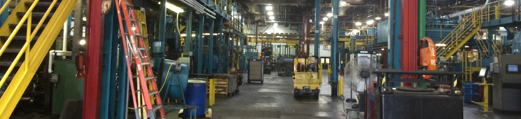 manufacturing facility interior photo with machinery and equipment