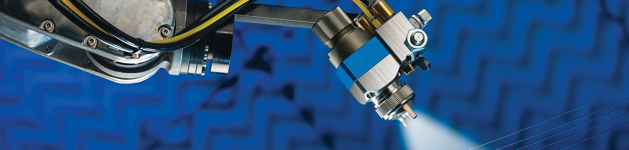 manufacturing facility close-up photo with blue and metallic machinery