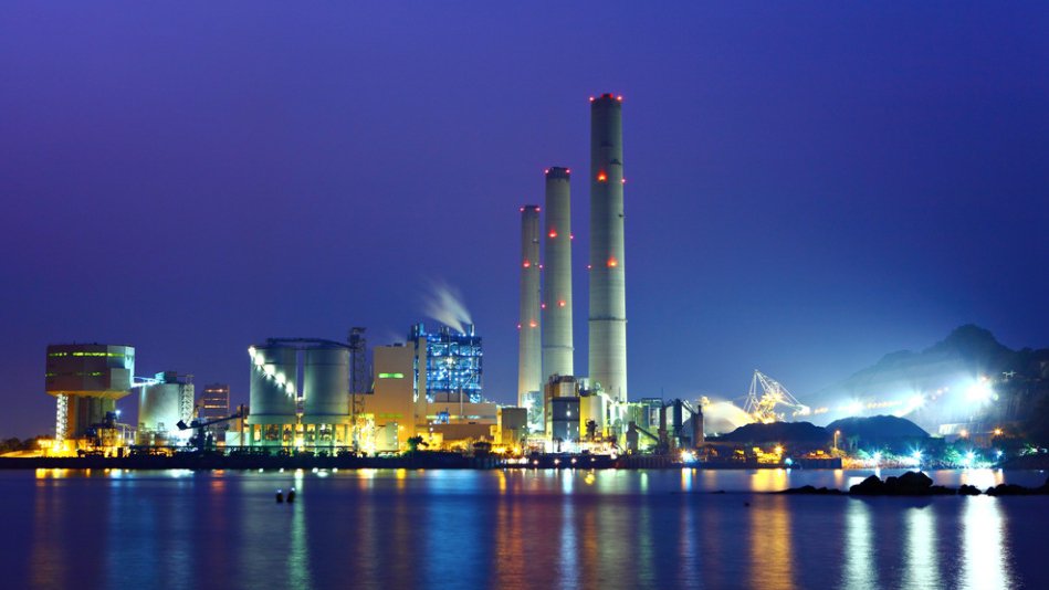 Power station at night in the city skyline