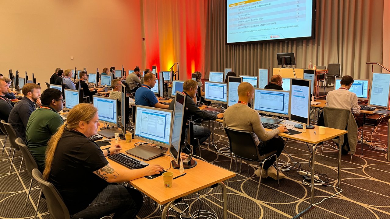 Customers in hands-on session in room with equipment
