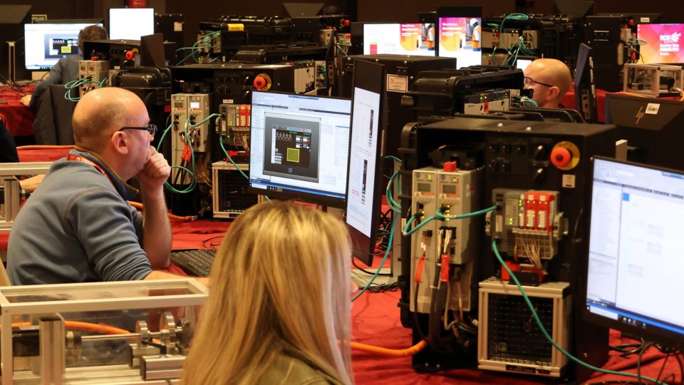 Customers in hands-on labs with equipment on the tables
